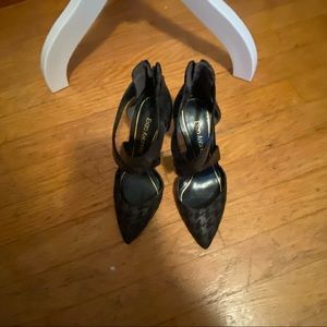 “Enzo Angiolini” houndstooth cross-cross pumps